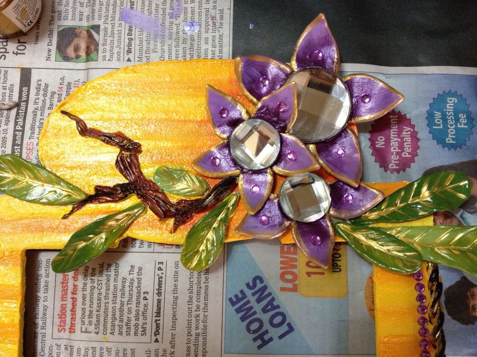 Done with the background as well. Note how I used contrasting shades. Yellow and purple always go well with each other. Always choose good color combinations.