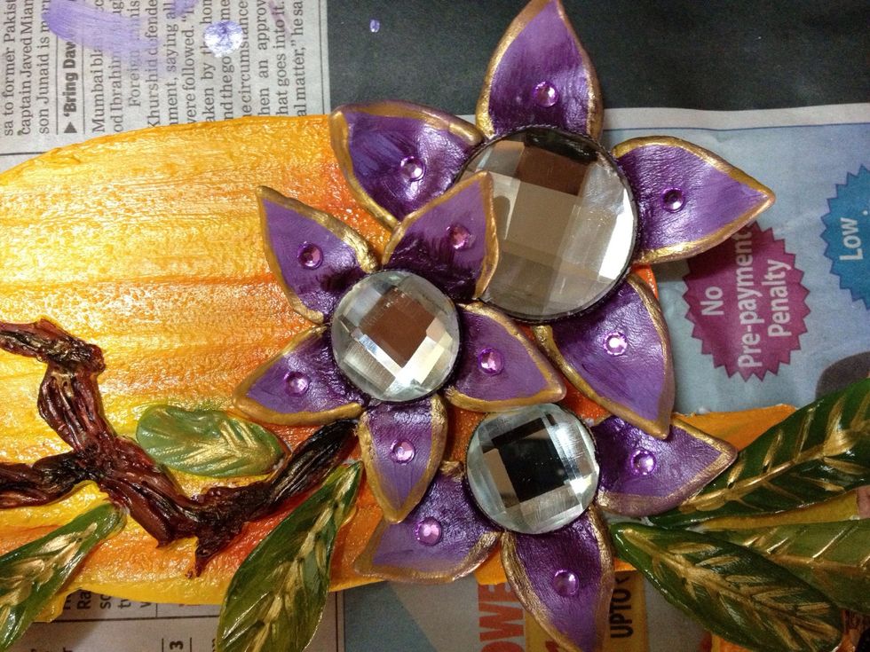 Done with the flowers leaves and branches. I added some stones on the flowers just to give it a nice bling! \u2b50