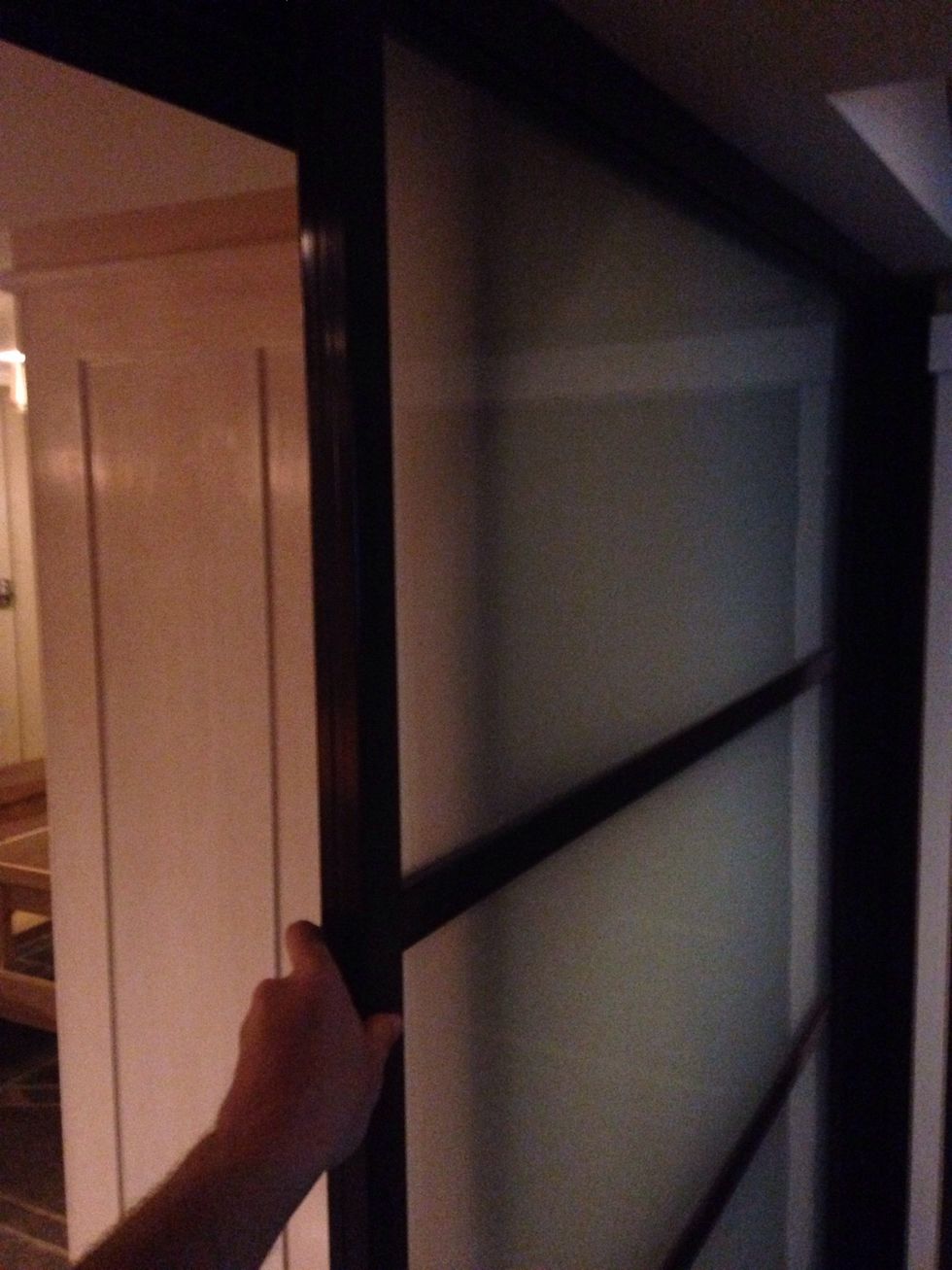 Doors slide open from behind the Murphy bed. Please open and close slowly