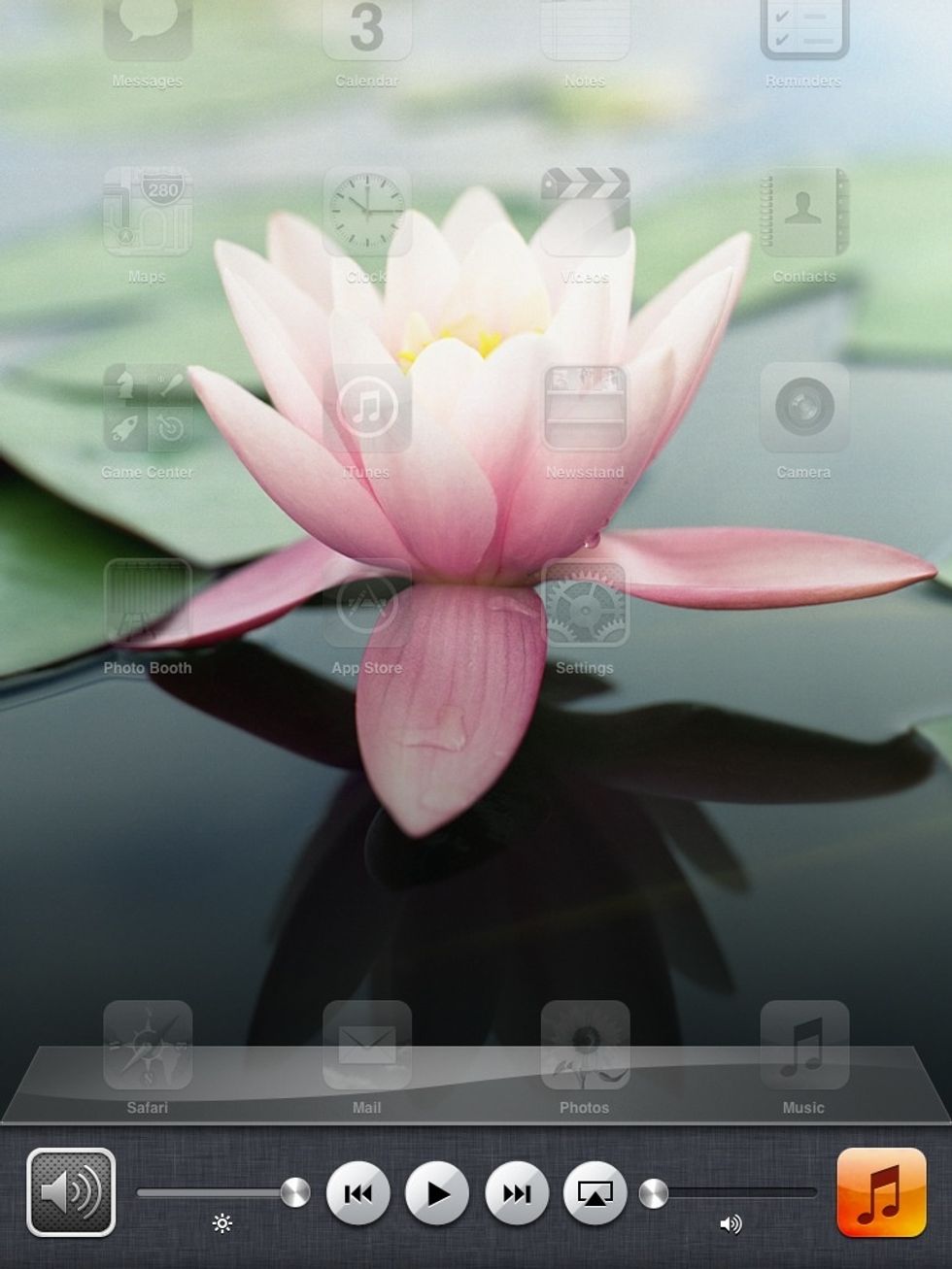 Double-Click your home button and scroll over to the volume and orientation controls.