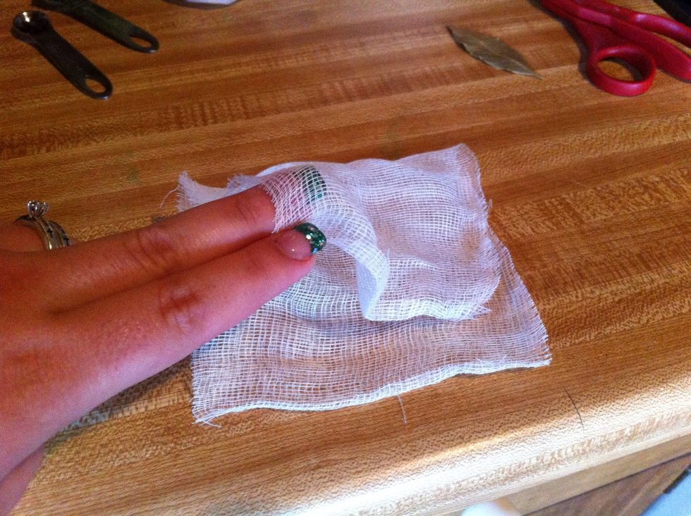 Double over a small square of cheese cloth
