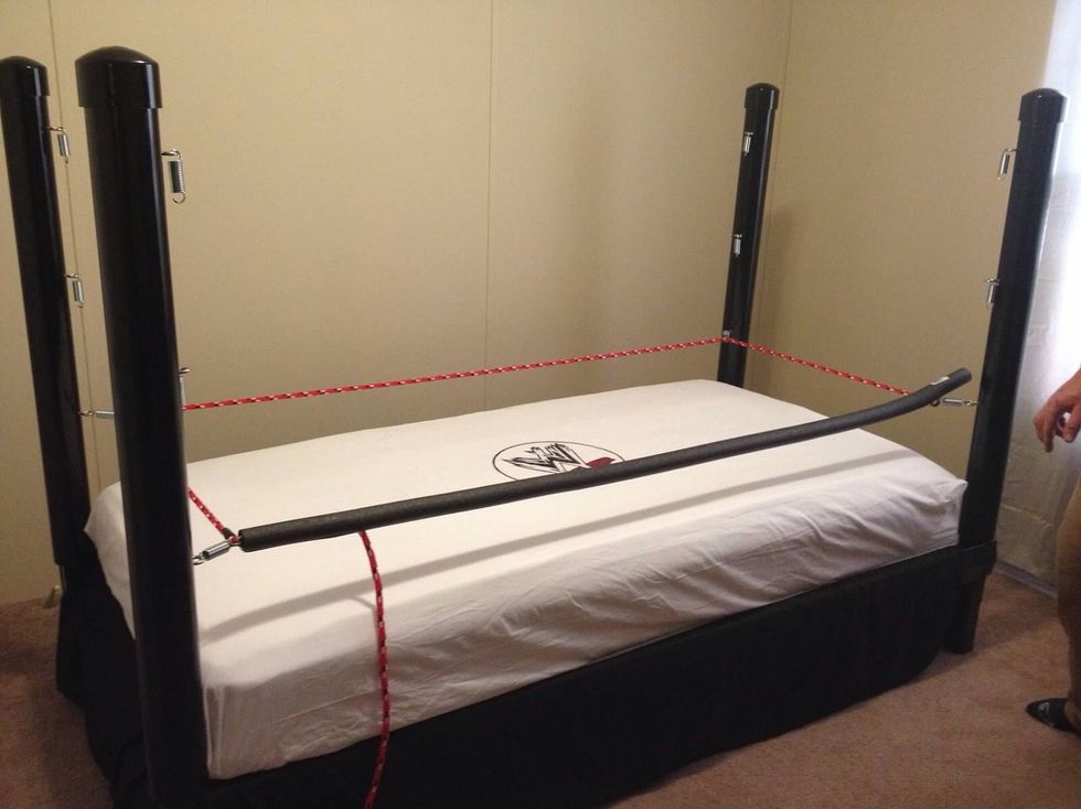 Double over the rope through the 1st ring and tape together well. Run the rope through the other rings all the way around the bed.  Repeat this for the other 2 ropes.