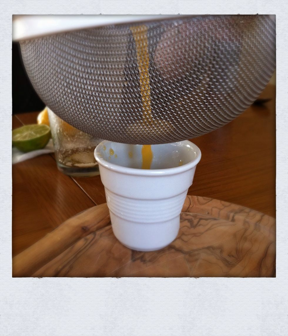 Double strain. (Pour from your shaker through a sieve to prevent any debris landing in your drink).