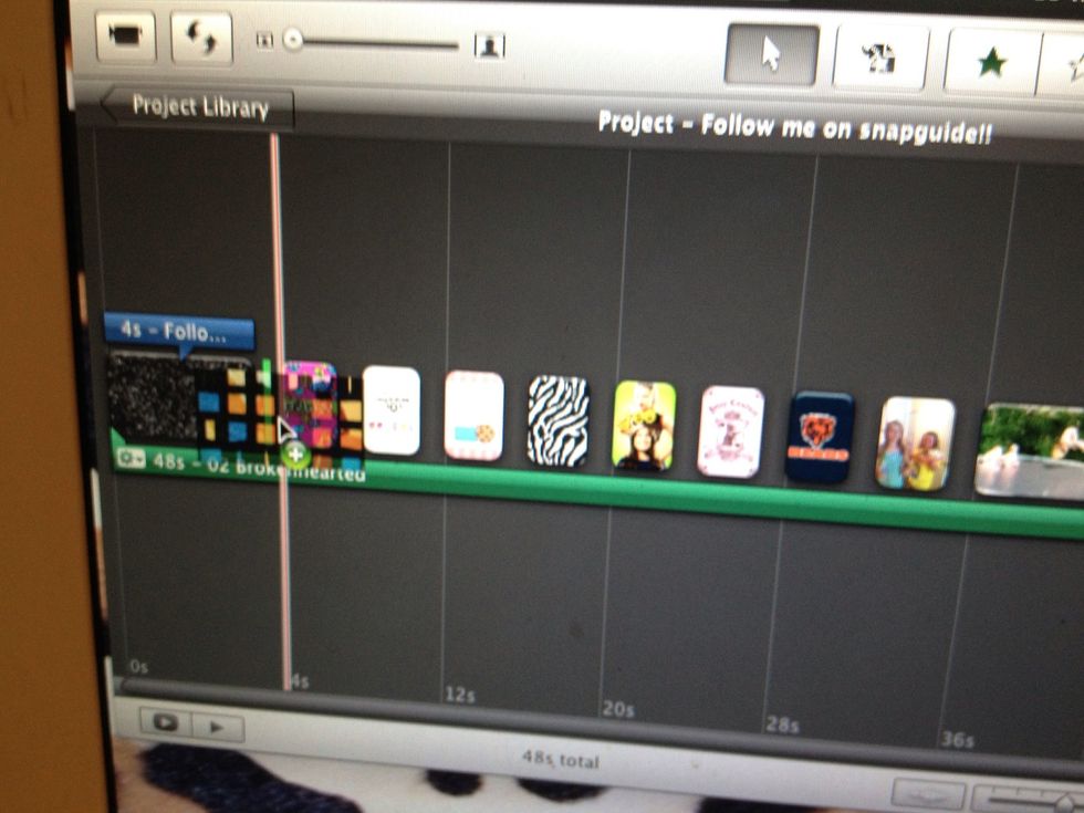 Drag it in between 2 clips