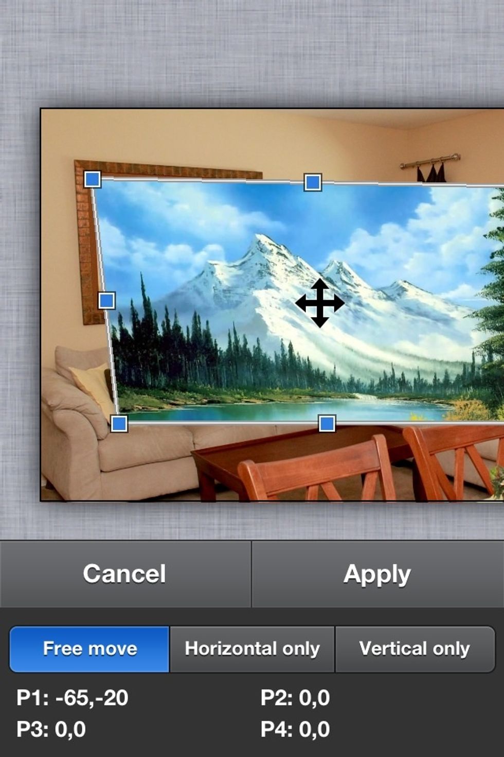 Drag the corners to line up with the corners of the picture frame on the wall.