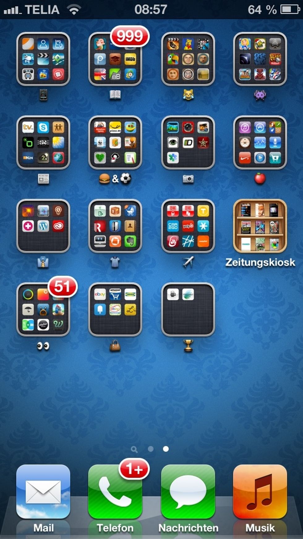 Drag your Apps onto each other in order to sort them into Folders.