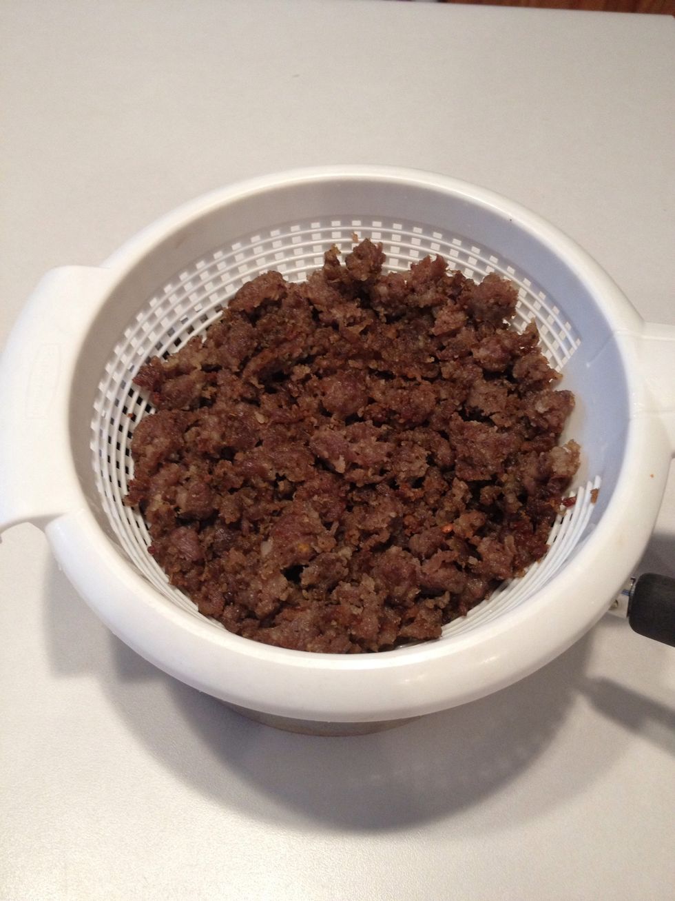Drain and discard grease from sausage.