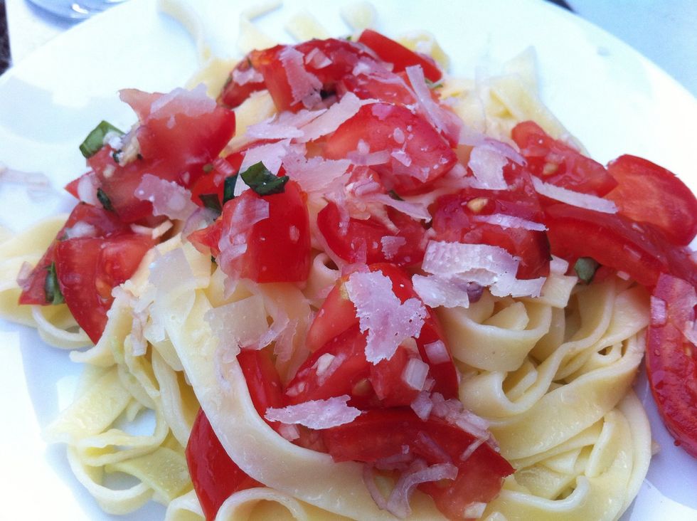 Drain and plate pasta, spoon veggies on top. Add Parmesan (optional)... and serve!