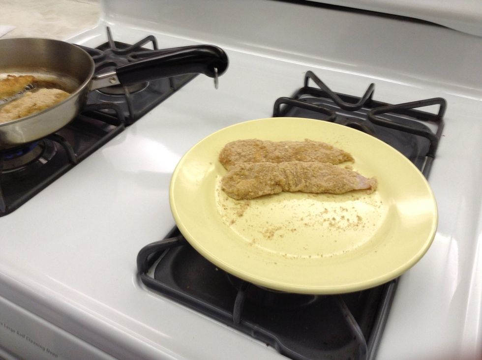 Drain fried chicken on paper towel then add to plate and keep warm. Repeat with the remaining breaded chicken.