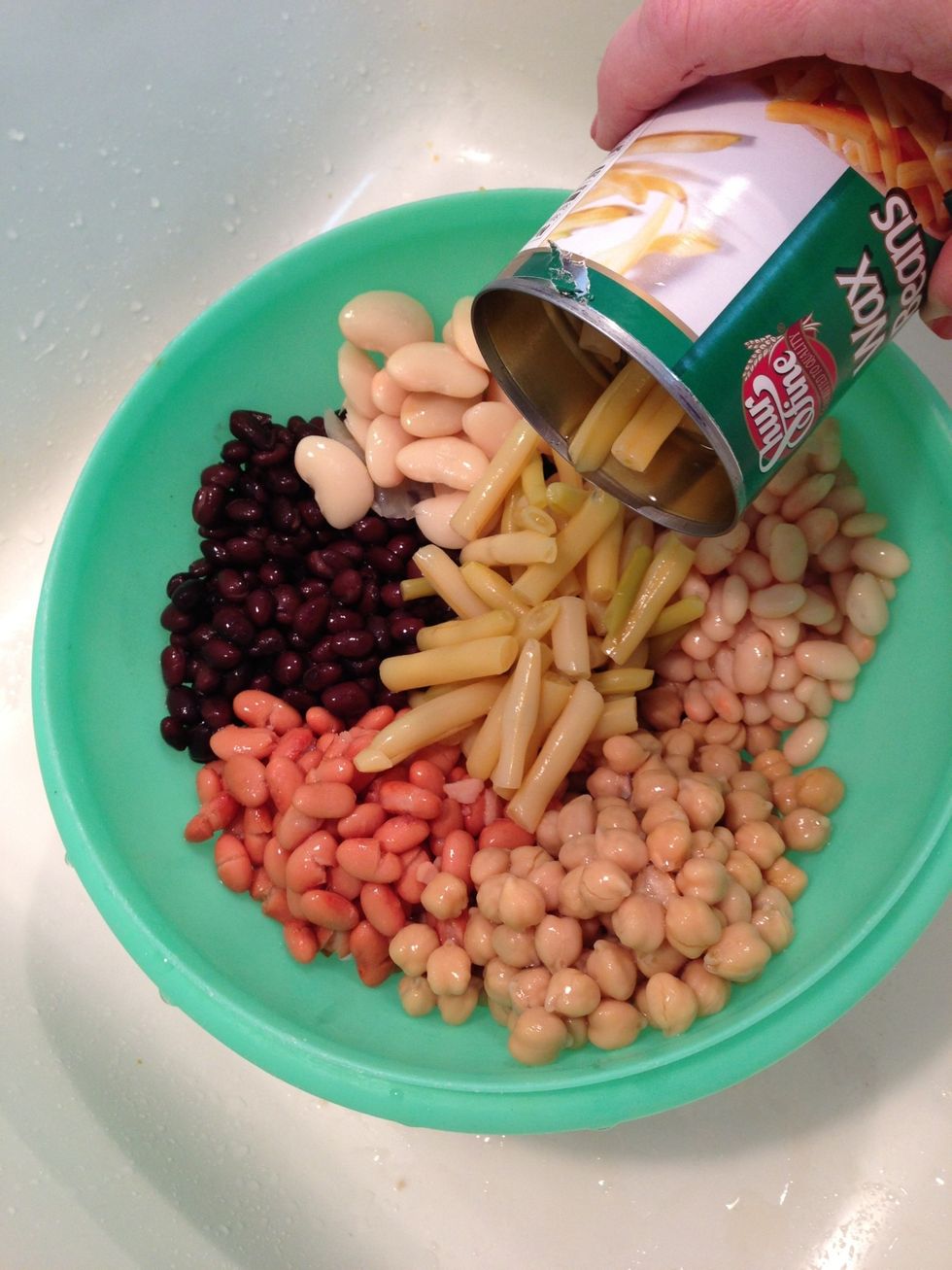 Drain liquid from al beans EXCEPT Baked Beans.
