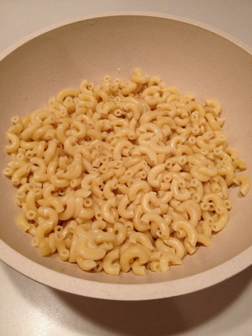 Drain macaroni and place in a mixing bowl.