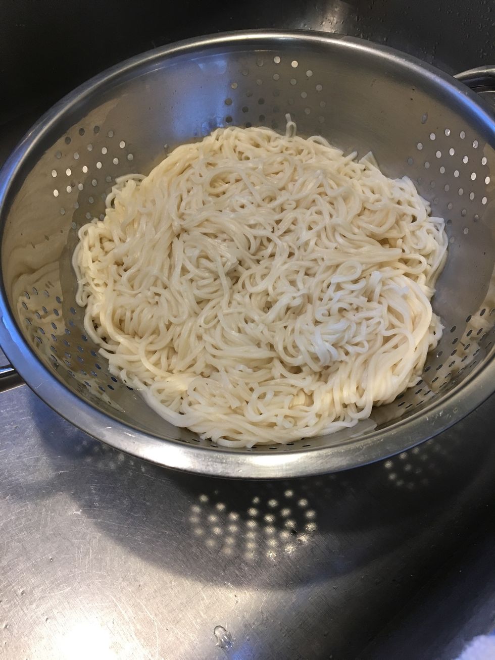 Drain noodles