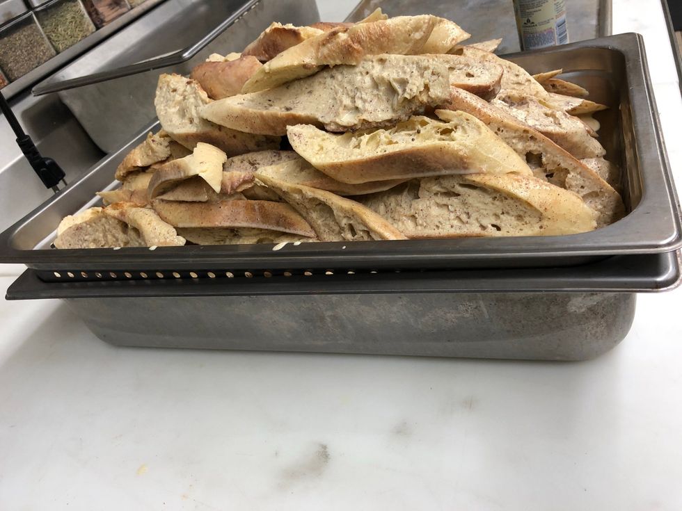 Drain off extra batter before putting on a tray