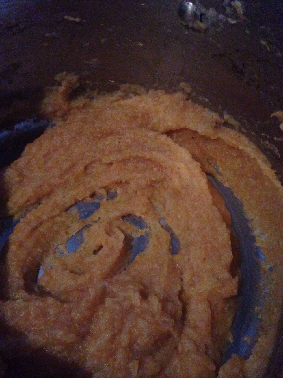Drain off the water from the celeriac mix and mash.  Put into a sieve and use a wooden spoon to stir vigorously so as to push the veg through the sieve to get it smooth. It will take a while ....