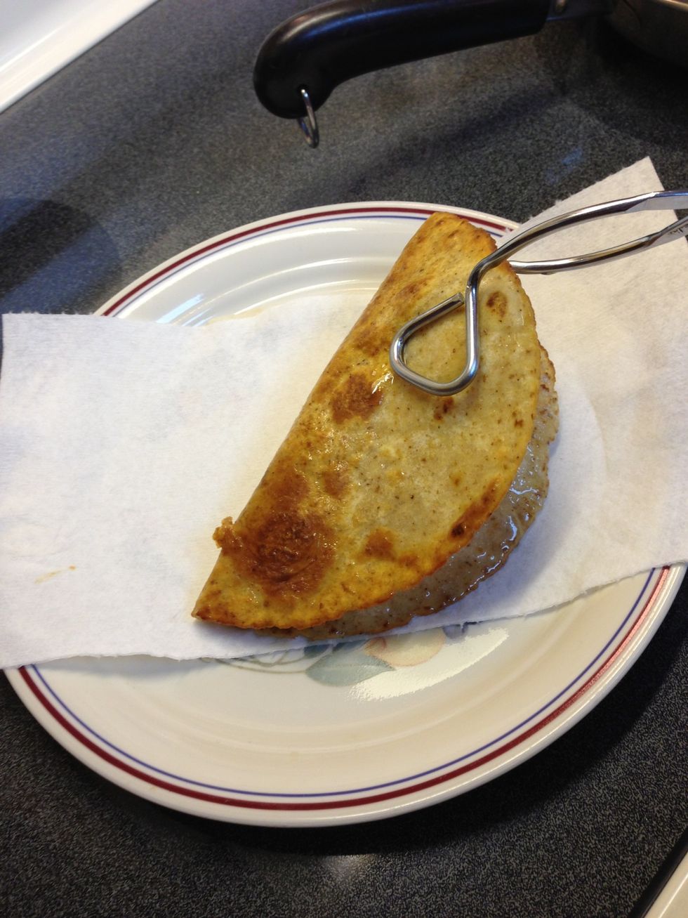 Drain on paper towel and have warmed meat ready to spoon into taco.