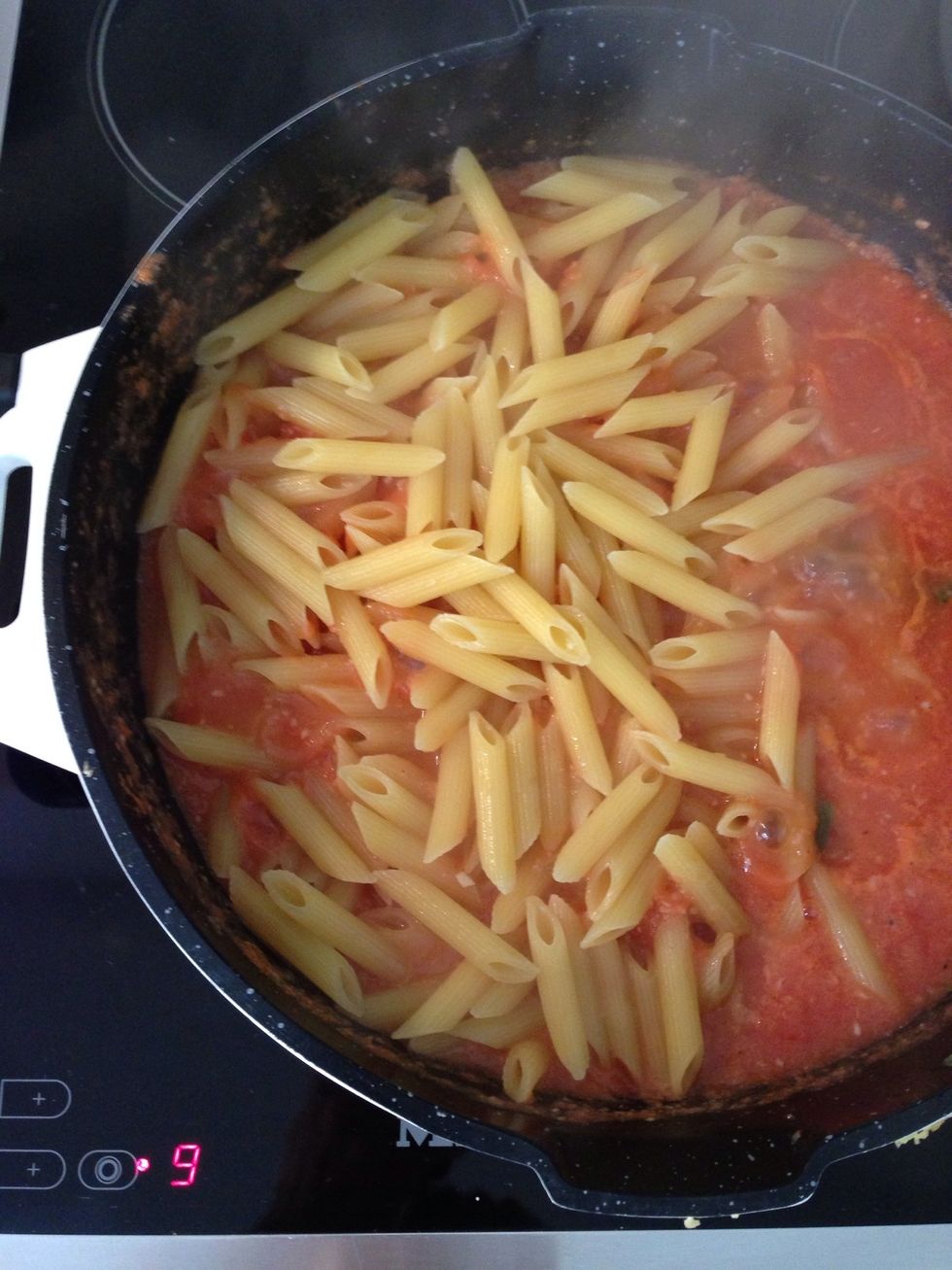 Drain pasta and add into the tomato sauce