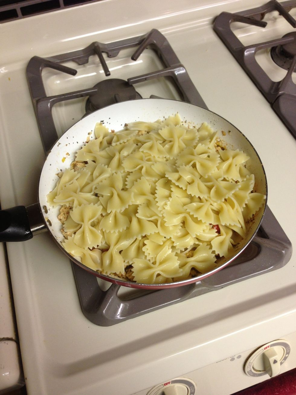 Drain pasta and mix it with the chicken