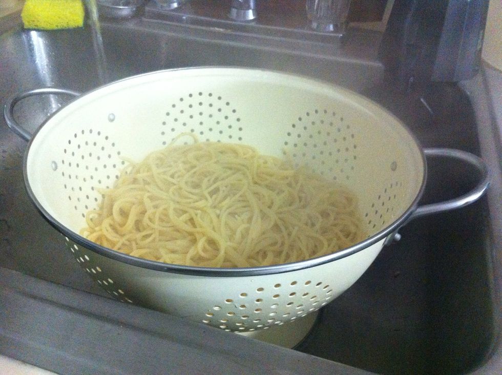 Drain pasta in the designer colander you purchased today because it shouldn't only be your husband who's allowed to spend too much money on inane objects