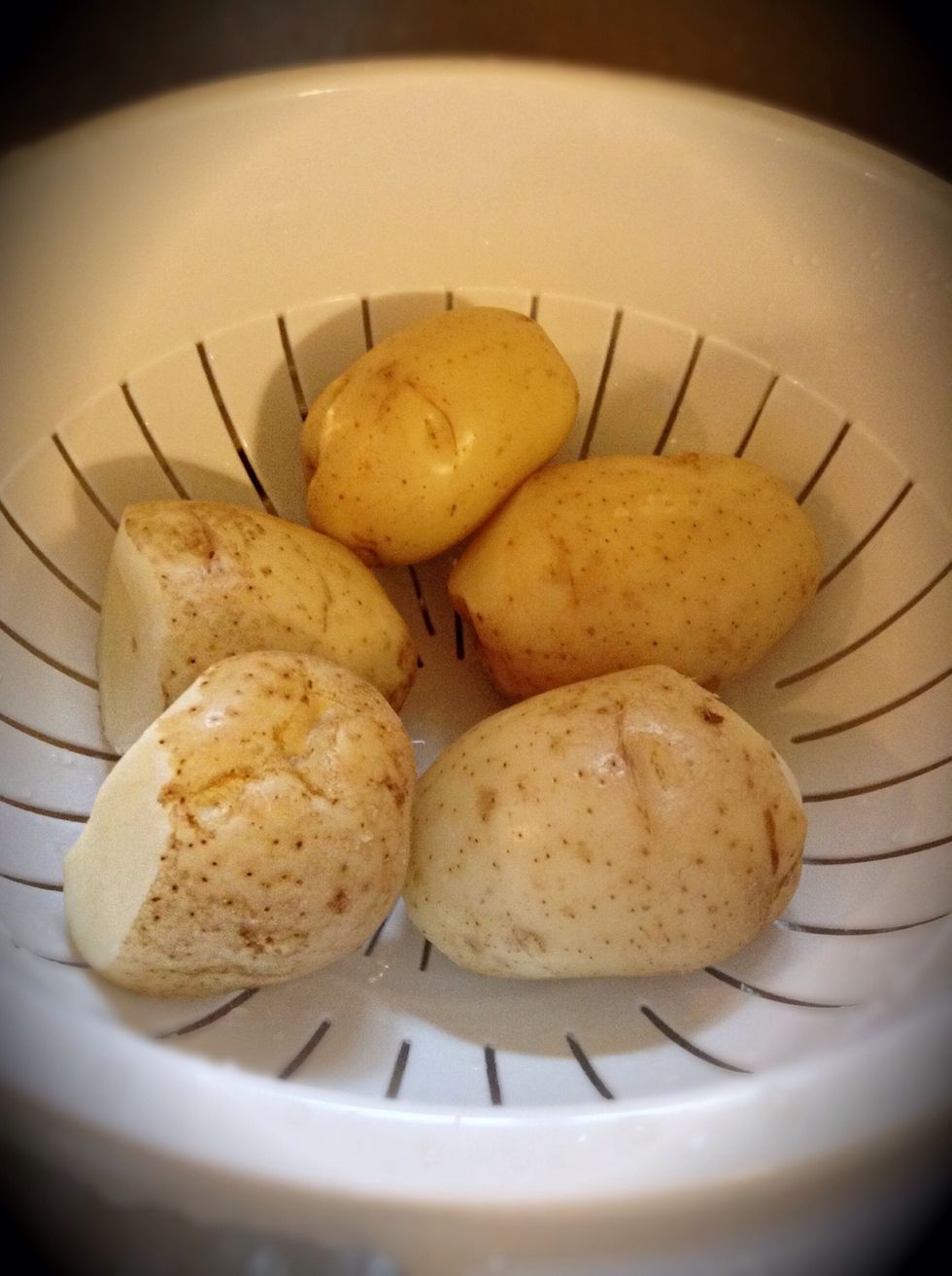 Drain potatoes.