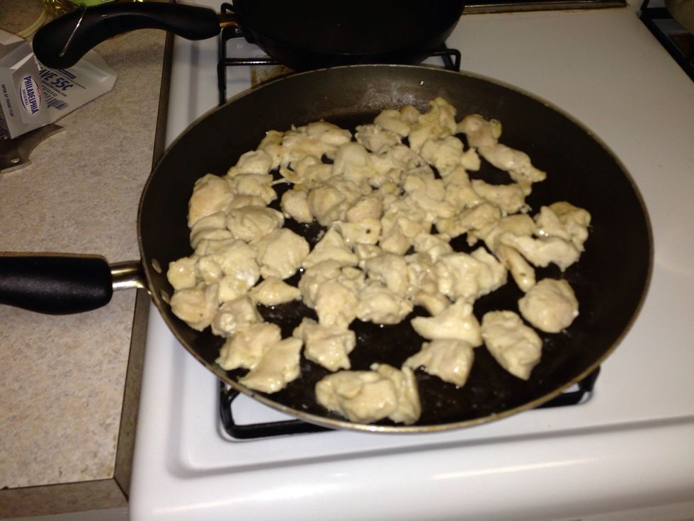 Drain the chicken as well and let it cook a bit longer. You can also turn the heat up, you'll have more time to pay attention to it so it doesn't burn.