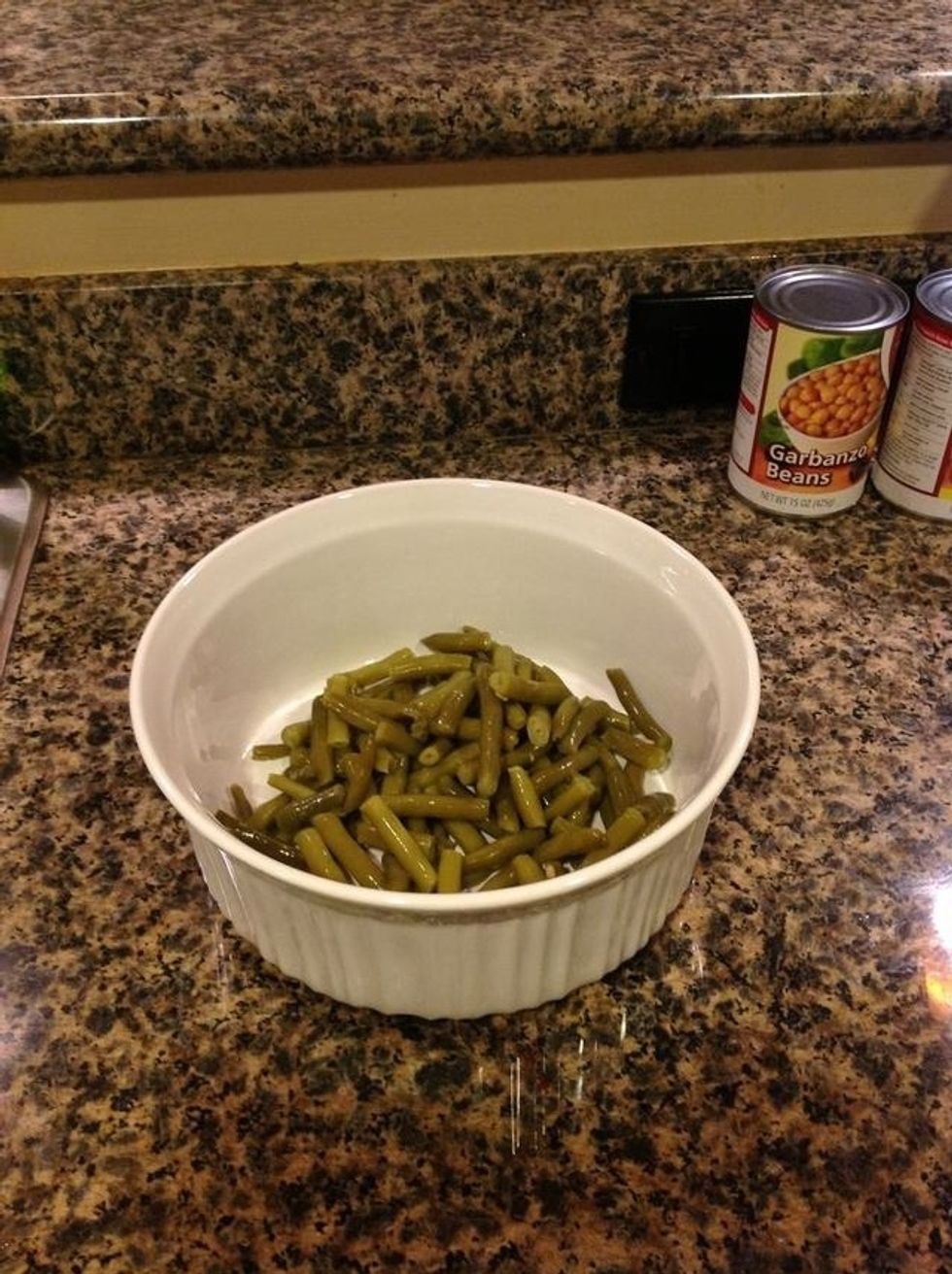 Drain the green beans and toss them in a bowl.