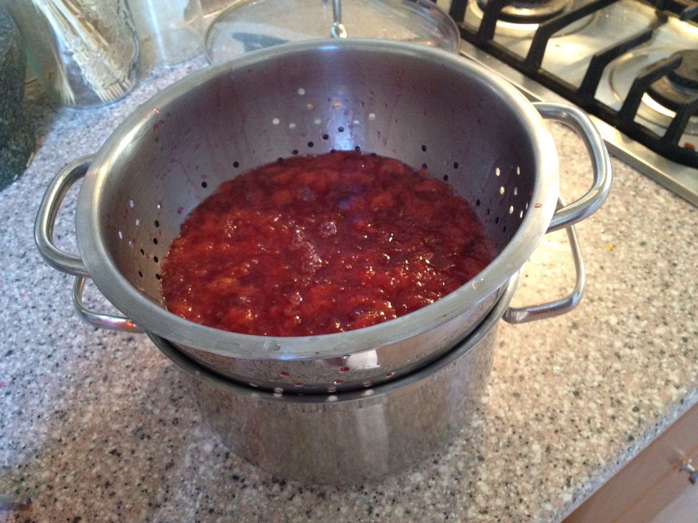 Drain the juice, I have some cheese cloth in the bottom of the colander. Use any cloth you got. Add sugar to the juice and bring to the boil. Bottle the juice and keep it in the fridge.