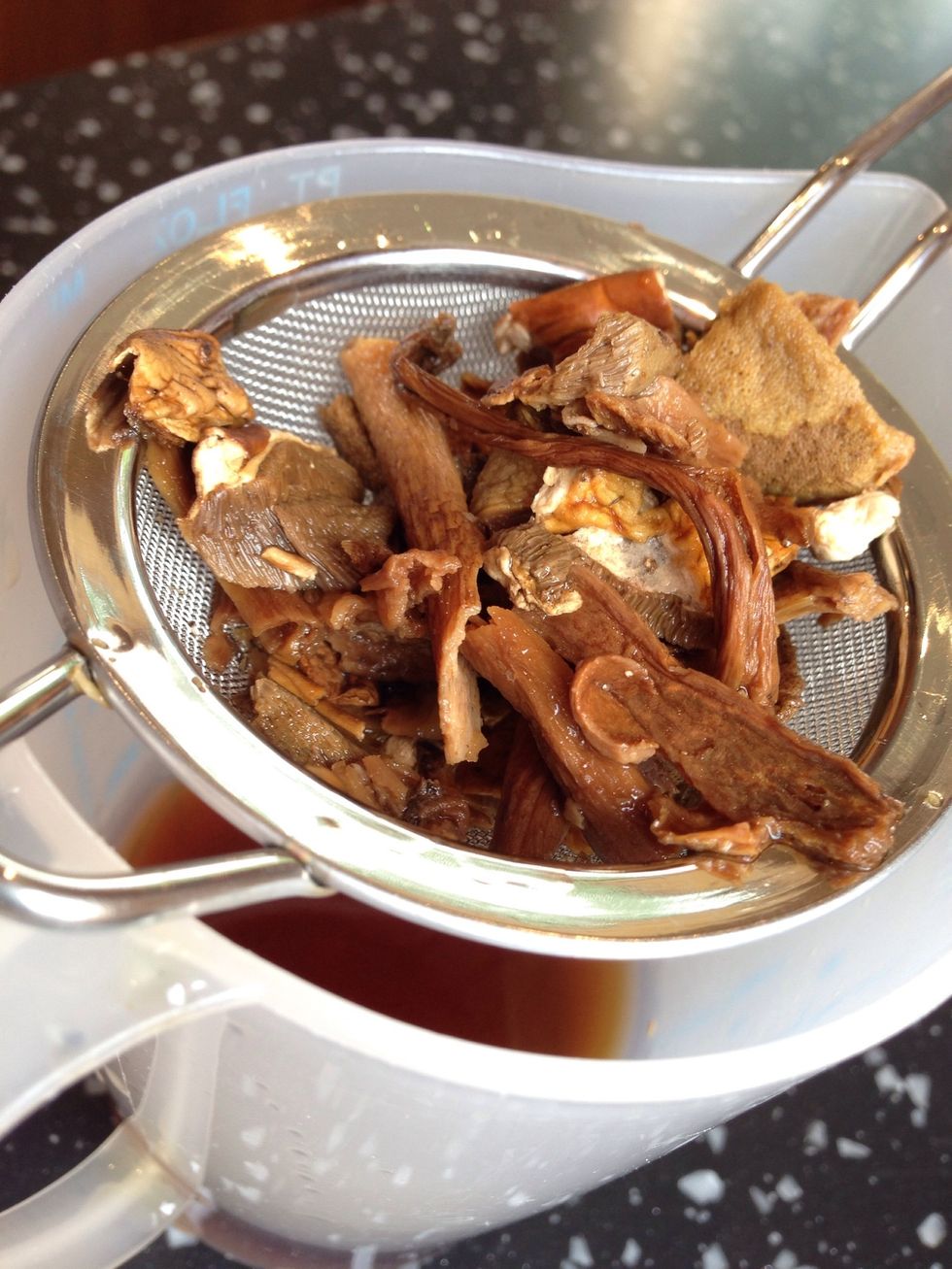 Drain the mushrooms in a sieve over a measuring jug and press mushrooms to remove as much water as possible. Make up the liquid to 225ml with Luke warm water