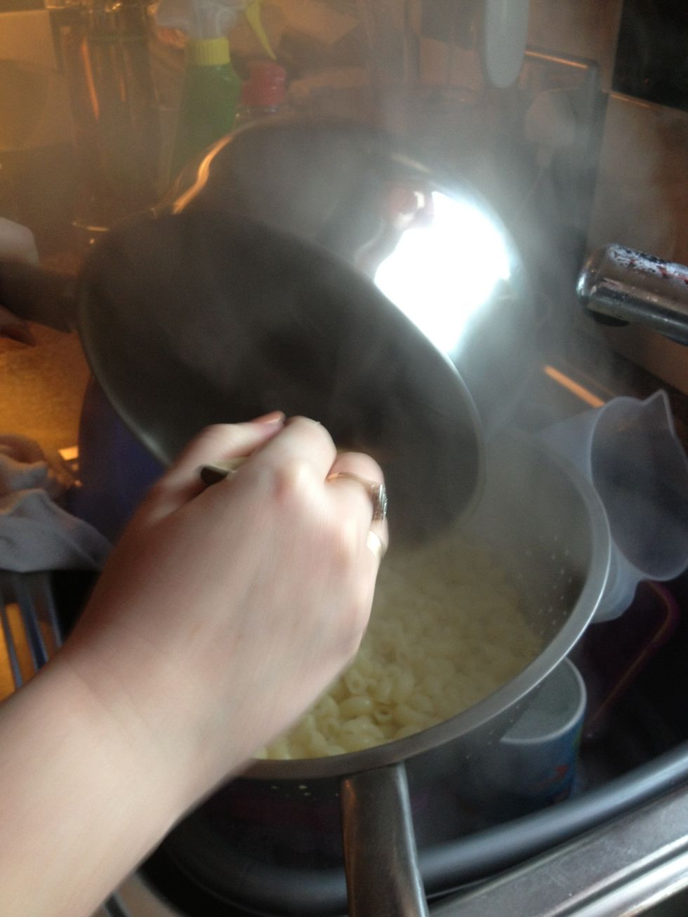 Drain the pasta and return it to the pot