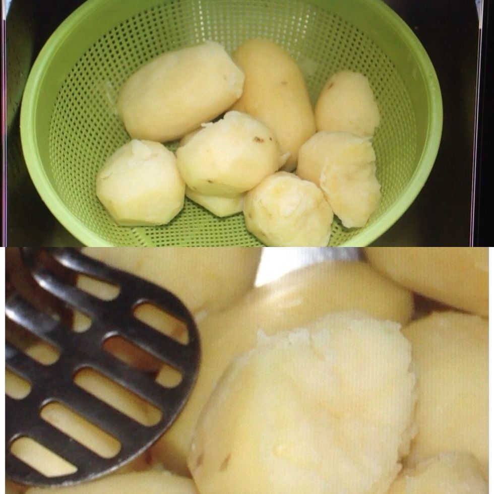Drain the potatoes and begin to mash them