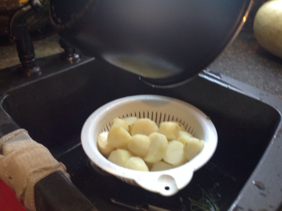 Drain the potatoes.