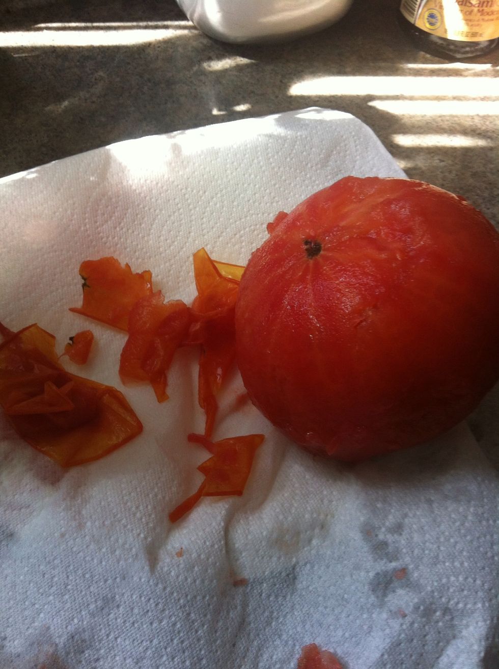 Drain tomatoes then peel the skin off