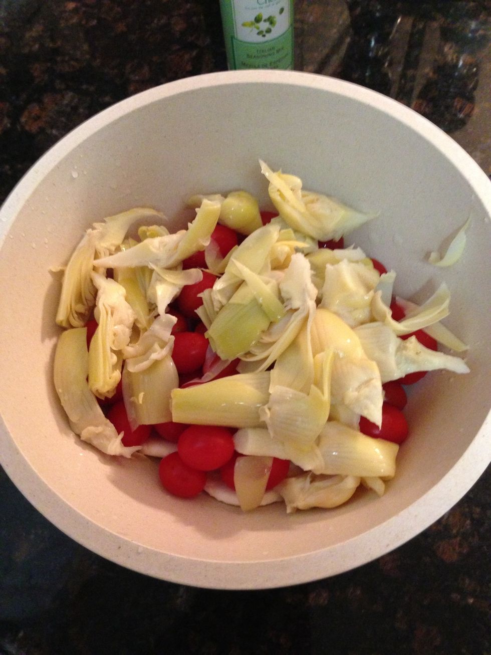 Drain water off artichokes & add to salad bowl
