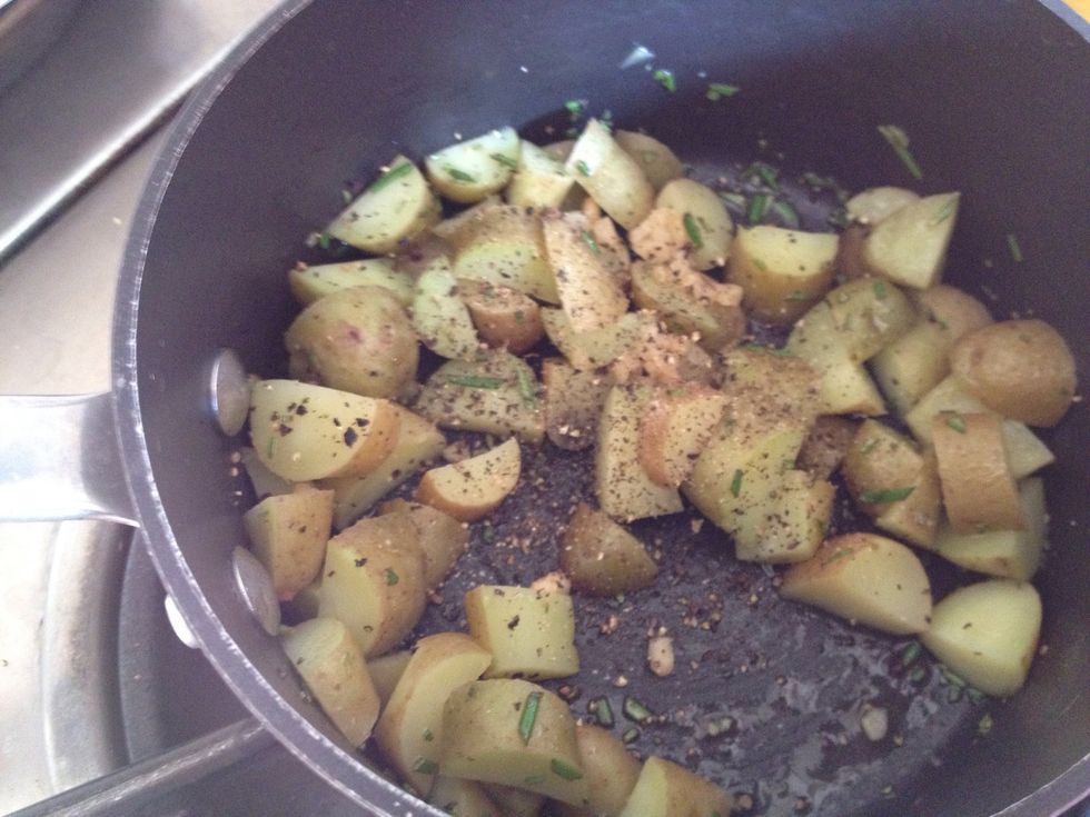 Drain water. Then add olive oil, rosemary, garlic, salt and pepper to taste