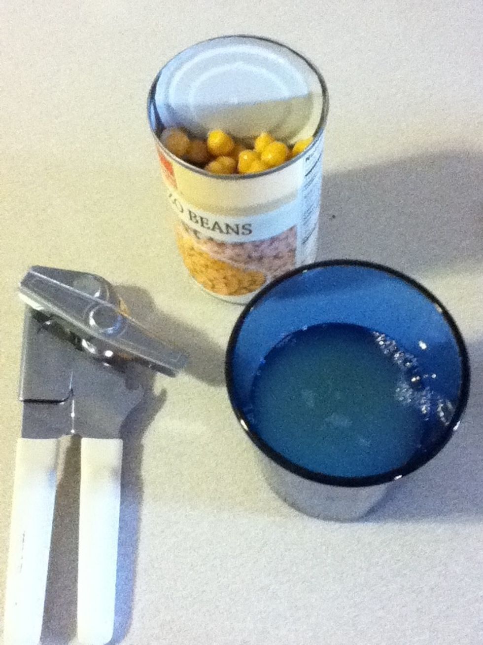Drain yer garbanzos into a cup. Save the liquid. Canned ones are actually better than dry in my opinion because they are easier to blend smooth. They are incredibly cheap either way.