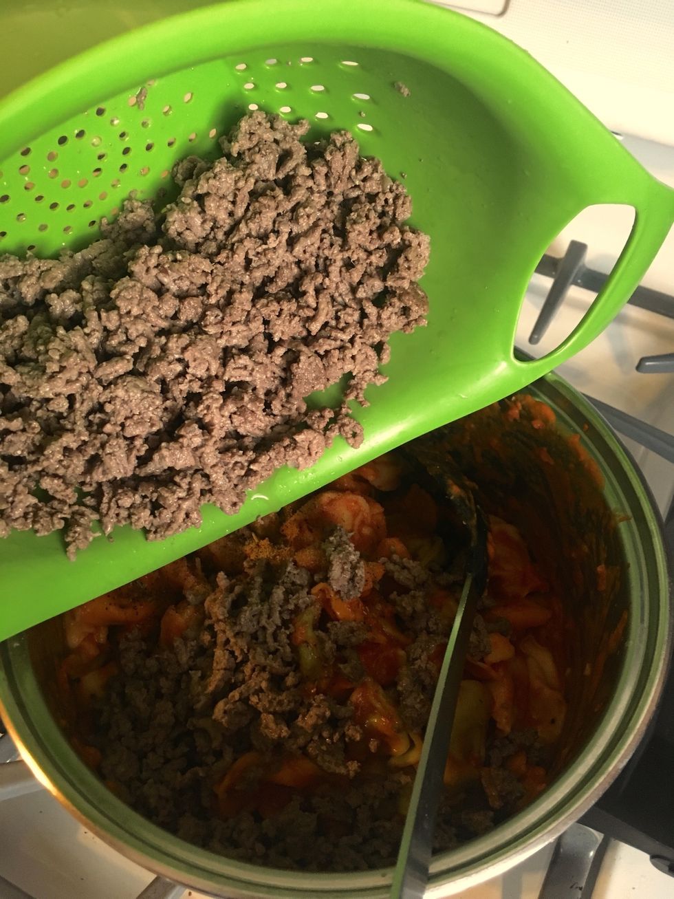 Drain your beef then add it to the noodles and sauce. Keep on low heat until sauce is warm.