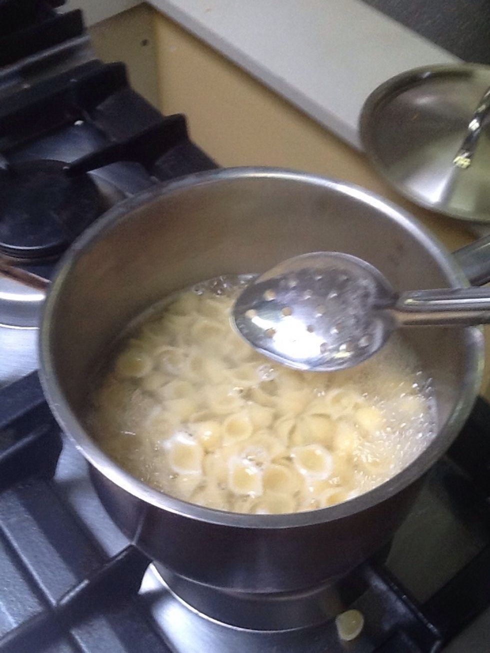 Drain your Pasta and put it into a plate.