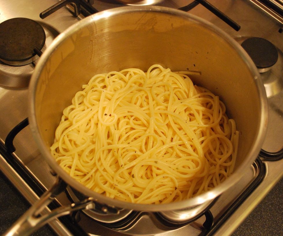 Drain your pasta, glug in a splash of olive oil and sprinkle some oregano over and stir to separate