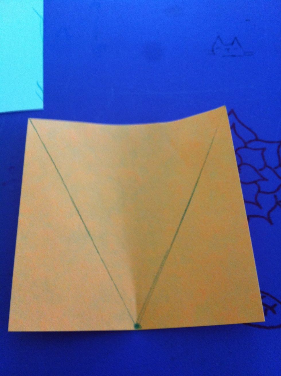 Draw 2 lines from the point to the corners of the paper. You may want some sort of straightedge.