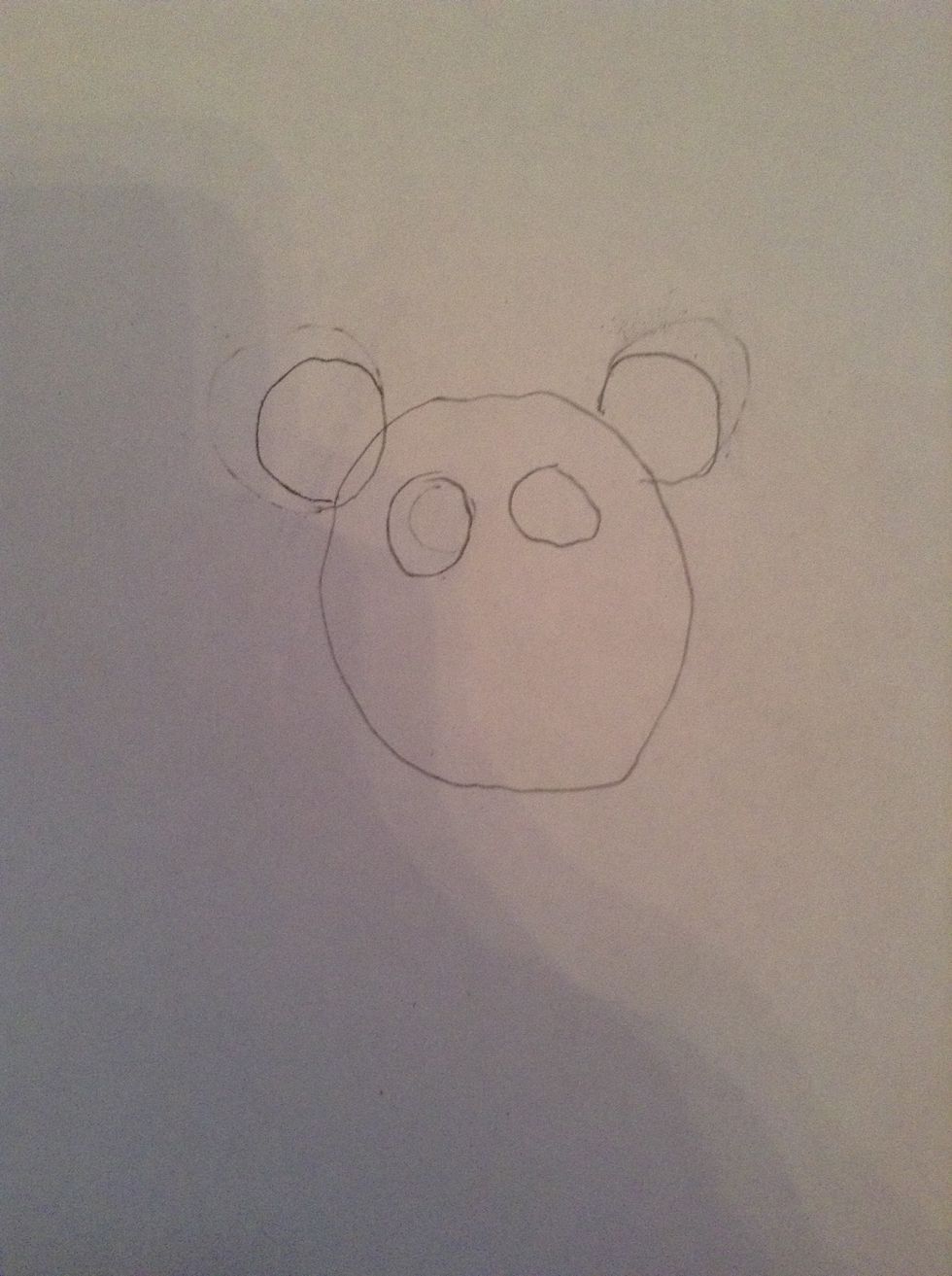 Draw 2 more circles for the eyes