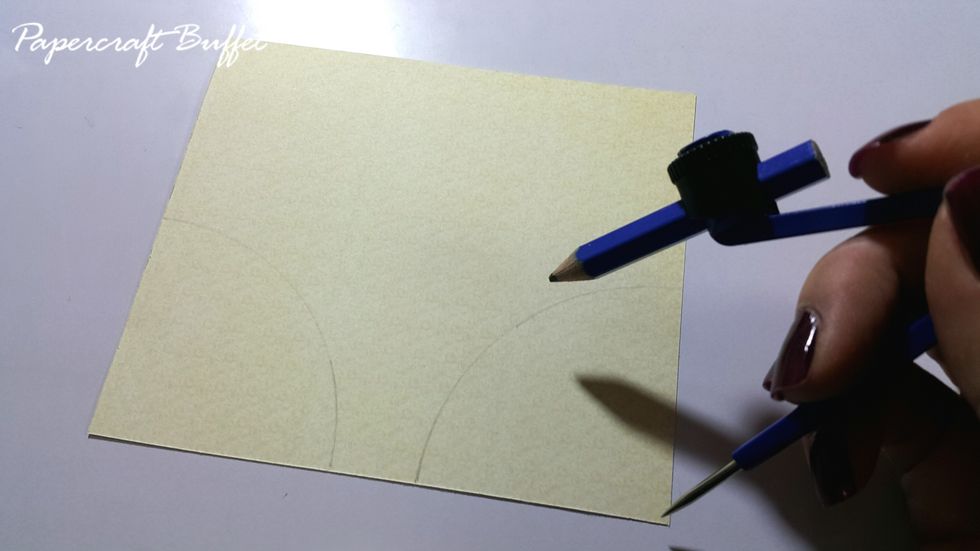 Draw 2pcs quarter of 2" radius circle on paper.