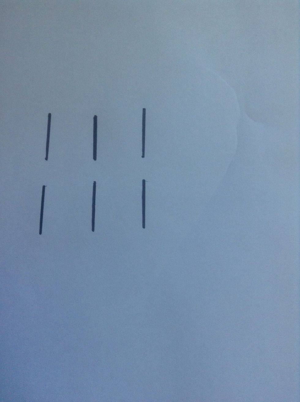 Draw 3 lines (2cm high and 2cm apart) do the same on the bottom.