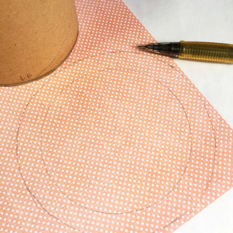 Draw a 0.5" bigger circle over.