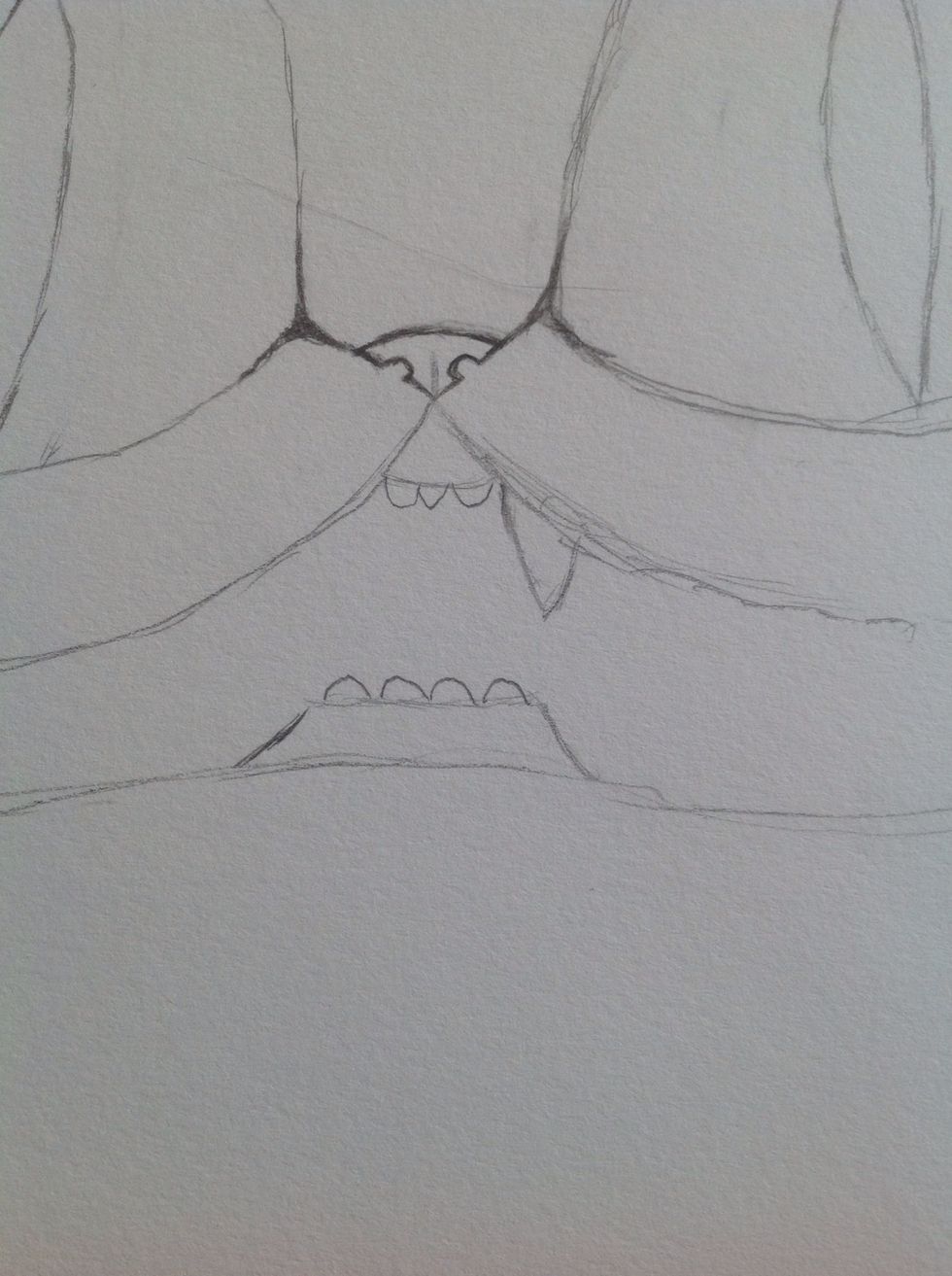 Draw a bigger and sharper tooth.