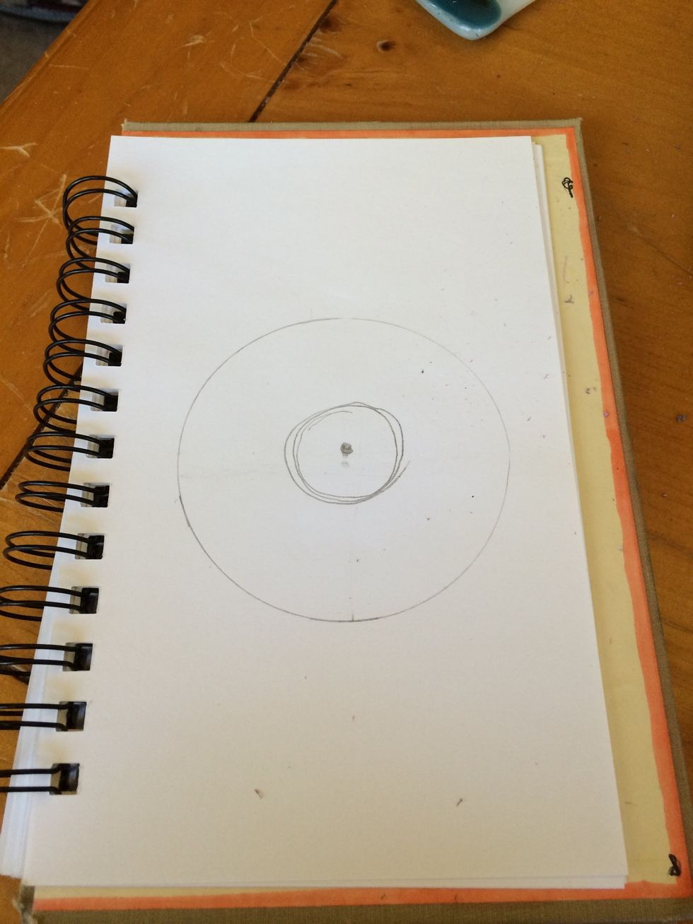 Draw a bigger circle around the little circle
