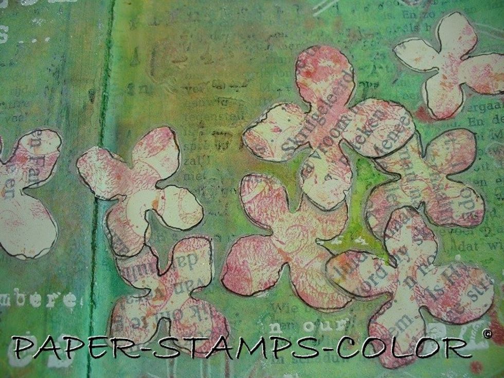 Draw a black line in a sketchy way around the edges of the flowers to make them pop a little.