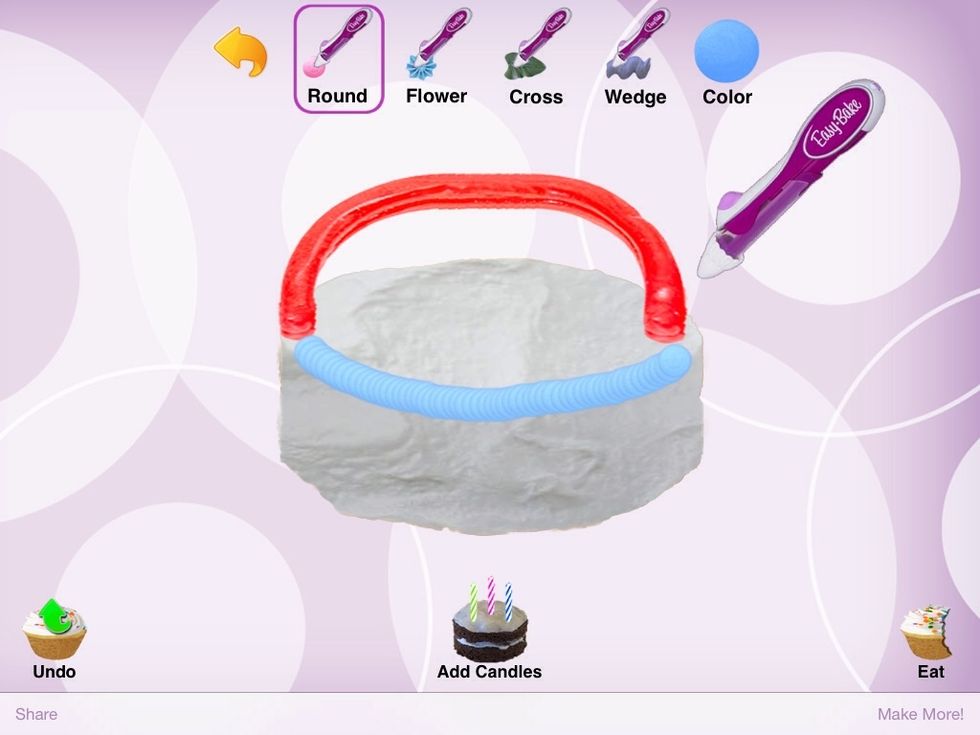 Draw a blue line on the first edge of the cake