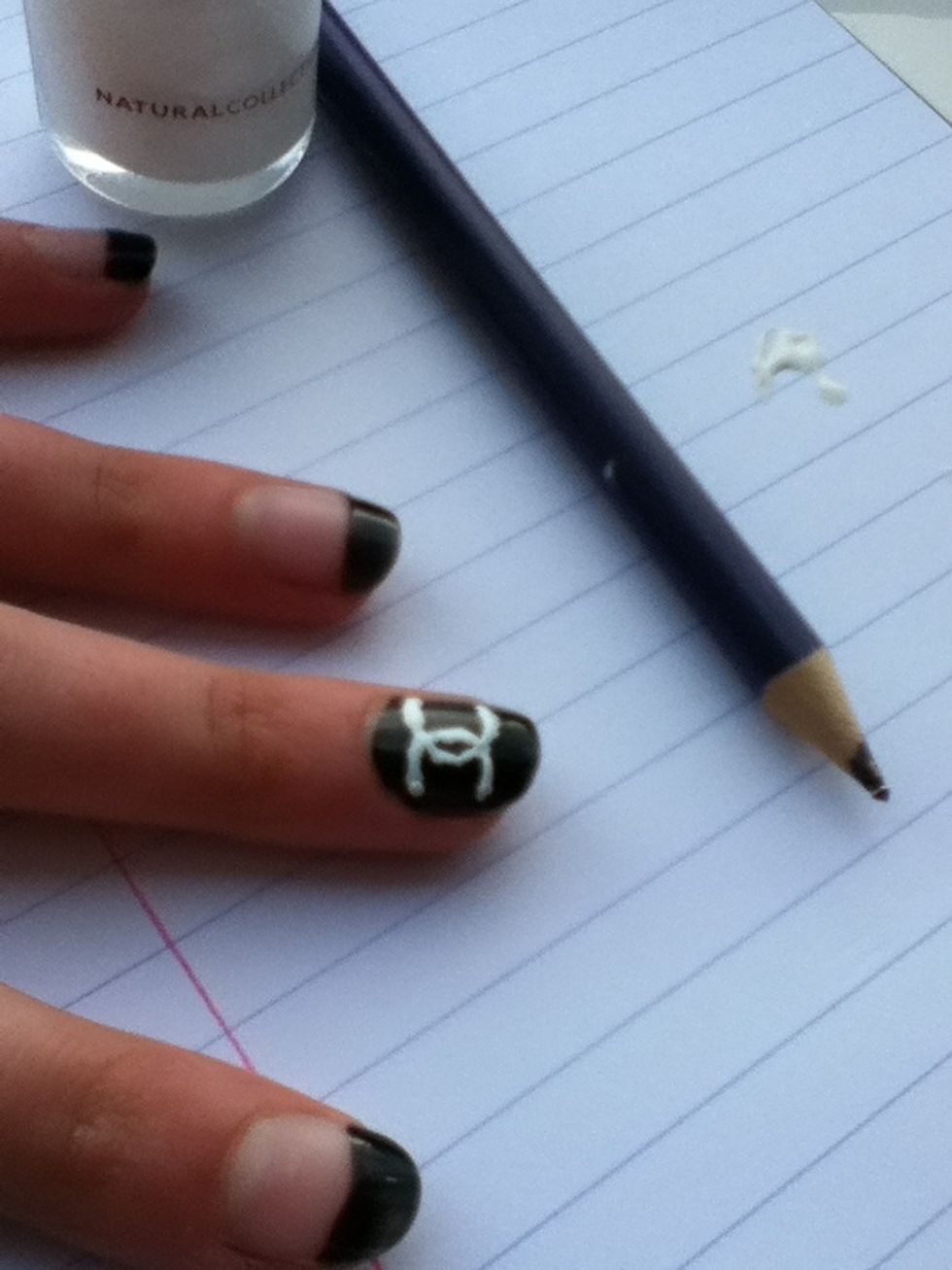 Draw a C on the right hand side of your nail, with the curve just over the middle of your nail. Then draw a back to front C which overlaps the other C.