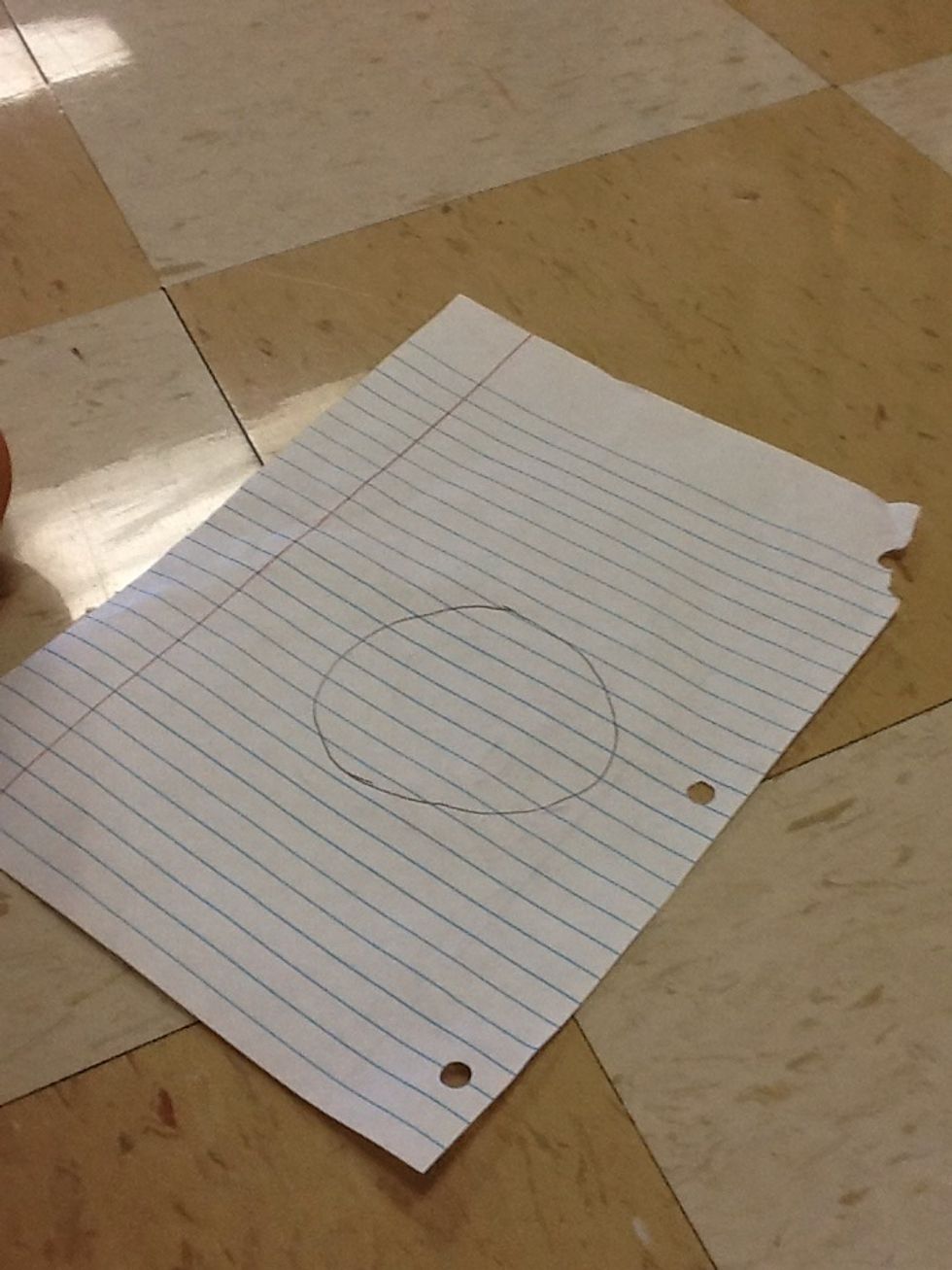 Draw a circle 3 inch Wide in the center of the paper.