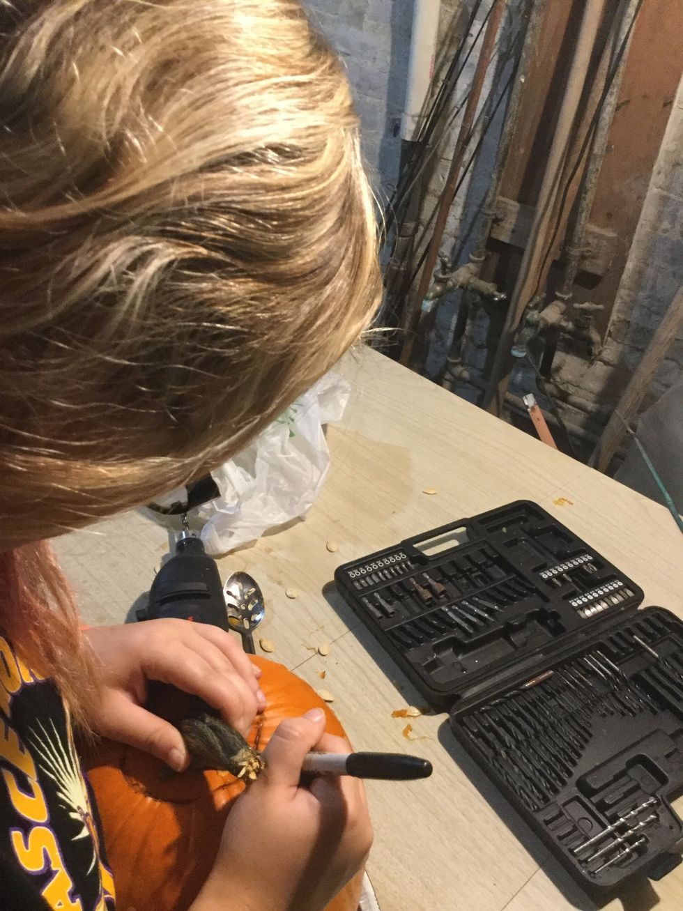 Draw a circle around the pumpkin stem.