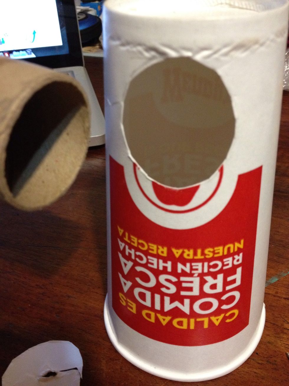 Draw a circle of the same size as the cylinder and cut it